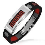 Svart / orange gummiband med st�l bes�ttning.